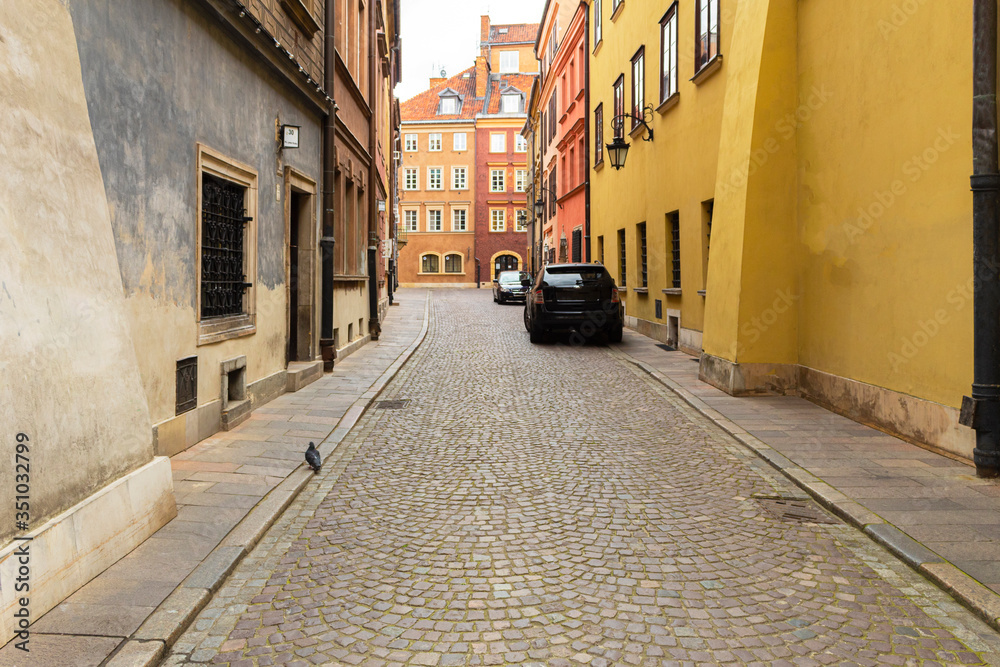 Warsaw, Poland - May 16, 2020: Cobbled street and houses in the old town