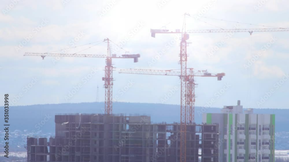 Cranes on construction site, timelapse Cranes on construction site, timelapse