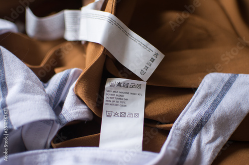 tag label on clothing recommendations for washing clothes fabrics photo