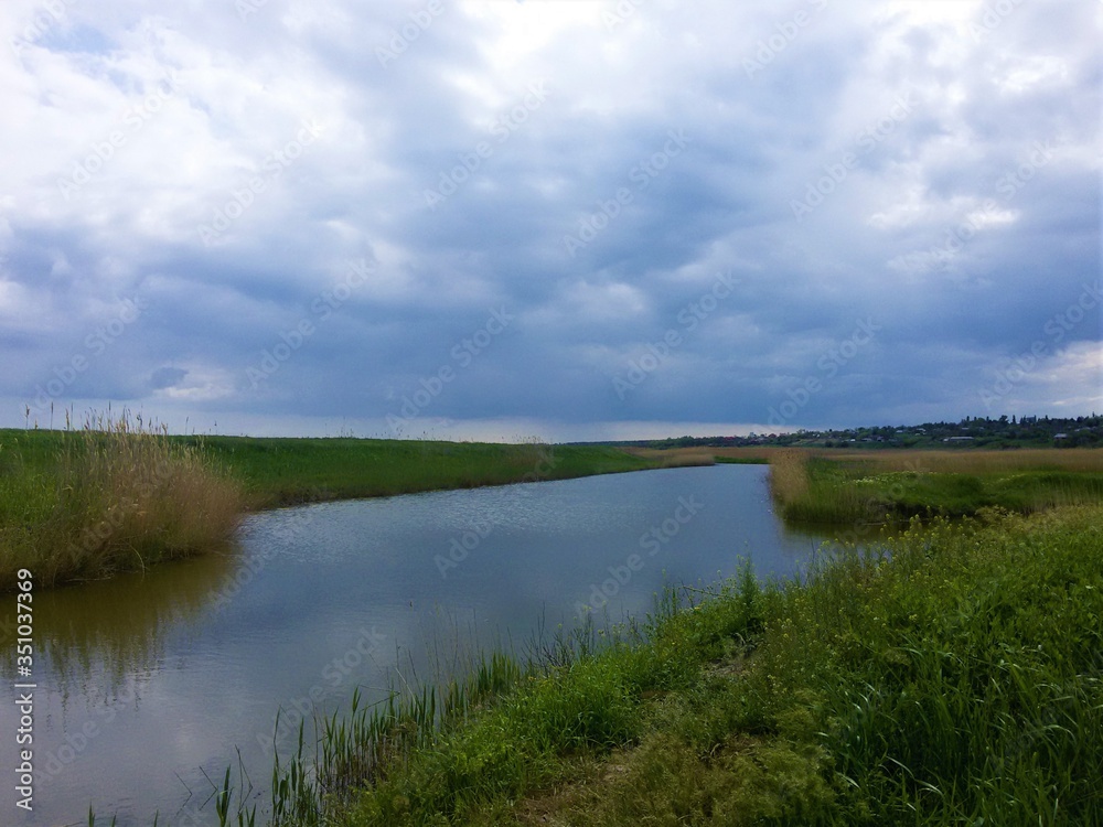 landscape with river and clouds