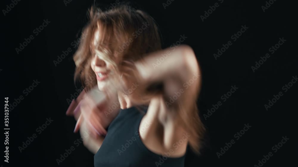 Close up face of adorable female with natural beauty enjoying dance. Shot with RED camera in 4K Close up face of adorable female with natural beauty enjoying dance. Shot with RED camera in 4K