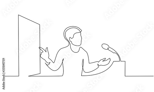 Young scientist presenter speaking with microphone near dashboard