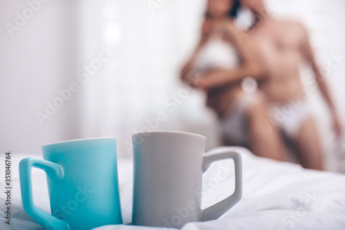 Coffee time. Good morning. Sexy couple. Erotica. Passionate concept. Passion. Love game. 