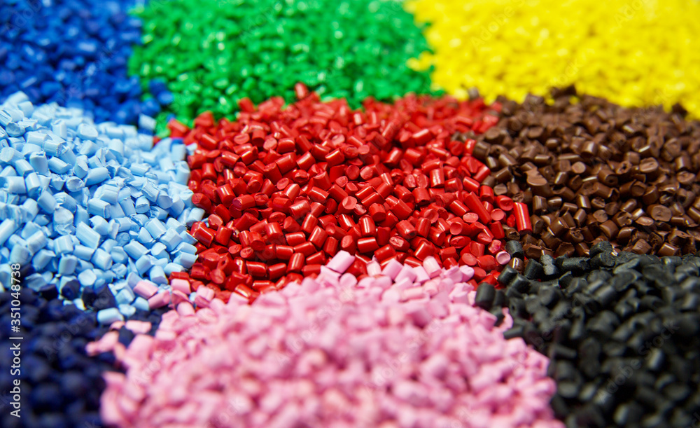 Multi colored plastic polymer granules  - obrazy, fototapety, plakaty 