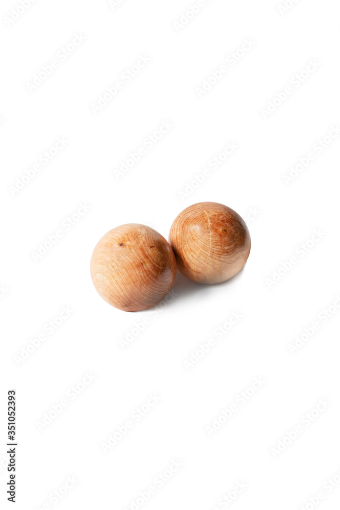 Wooden meditation balls isolated on a white background. Wooden meditation balls isolated on a white background.