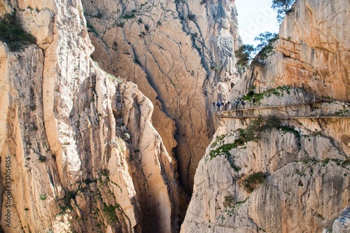Hikers walking on a precipitous trail in Caminito del rey, Andalusia, Spain
