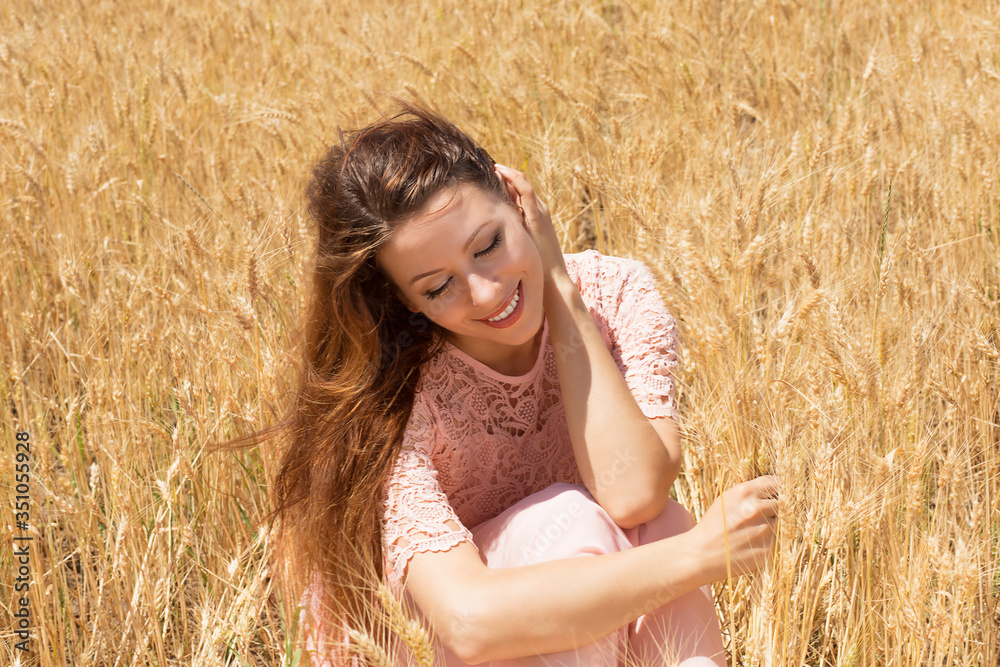 Beautiful Teenage Model girl Lying on the Field in Sun Light Beautiful Teenage Model girl Lying on the Field in Sun Light