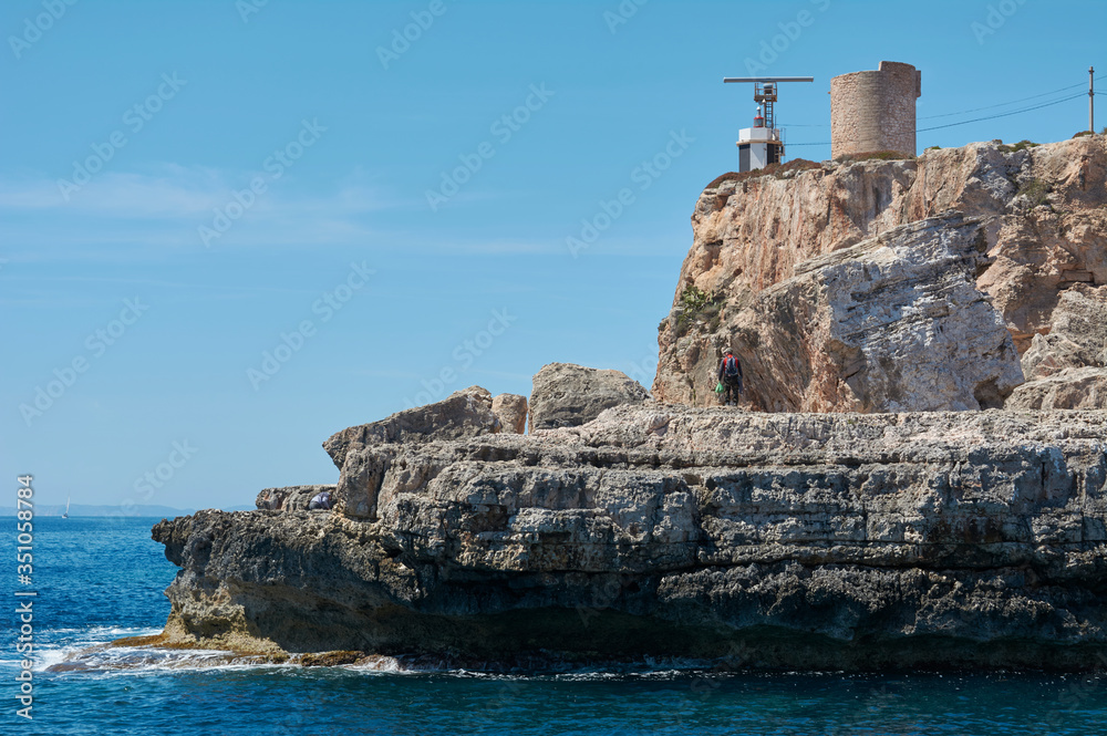 Cala Figuera - beautiful coastline and view of old lighthouse in Cala Figuera, Mallorca, Spain