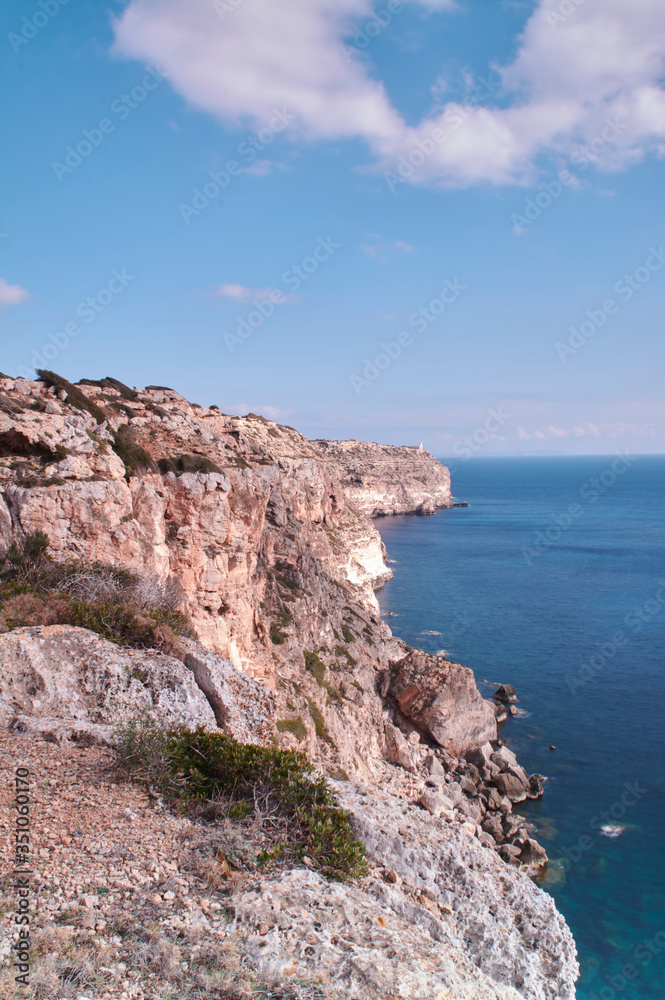 Far de Cap Blanc at Mallorca, Spain cliffs view, lighthouse, cabrera island Far de Cap Blanc at Mallorca, Spain cliffs view, lighthouse, cabrera island
