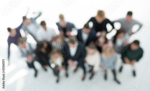 top view. blurry image a group of ambitious young business people. © ASDF