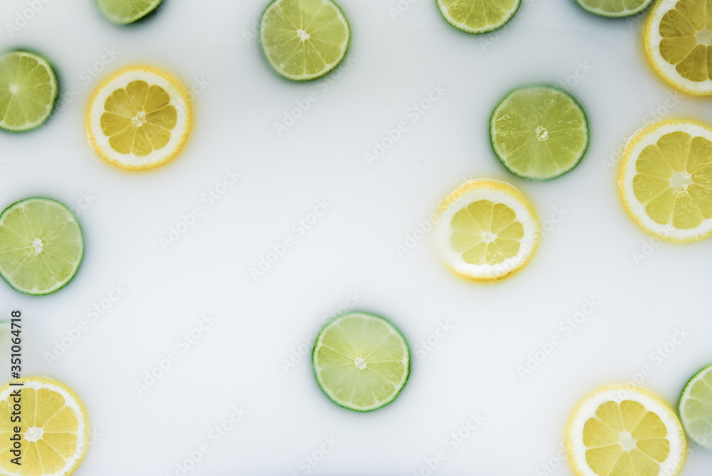 Relaxing milk bath with lemons and limes