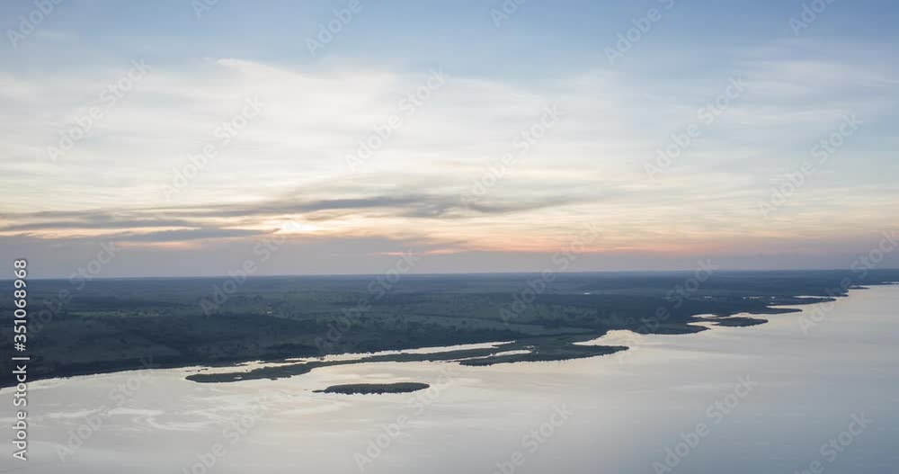 Aerial hyperlapse on the closed forest river with sky darkening between clouds in Brazil Aerial hyperlapse on the closed forest river with sky darkening between clouds in Brazil