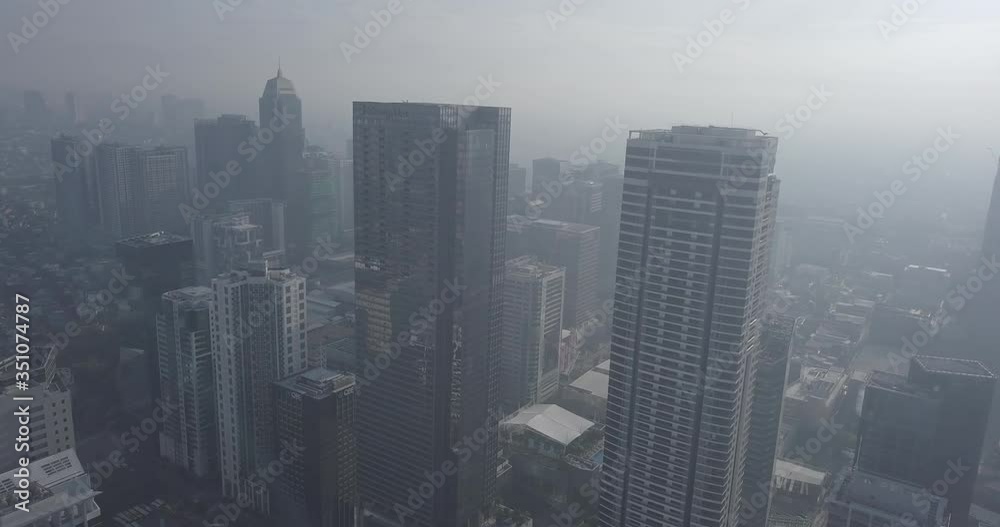 Ungraded, Panel aerial flight through business district's skyscrapers. Drone, 4K. Ungraded, Panel aerial flight through business district's skyscrapers. Drone, 4K.
