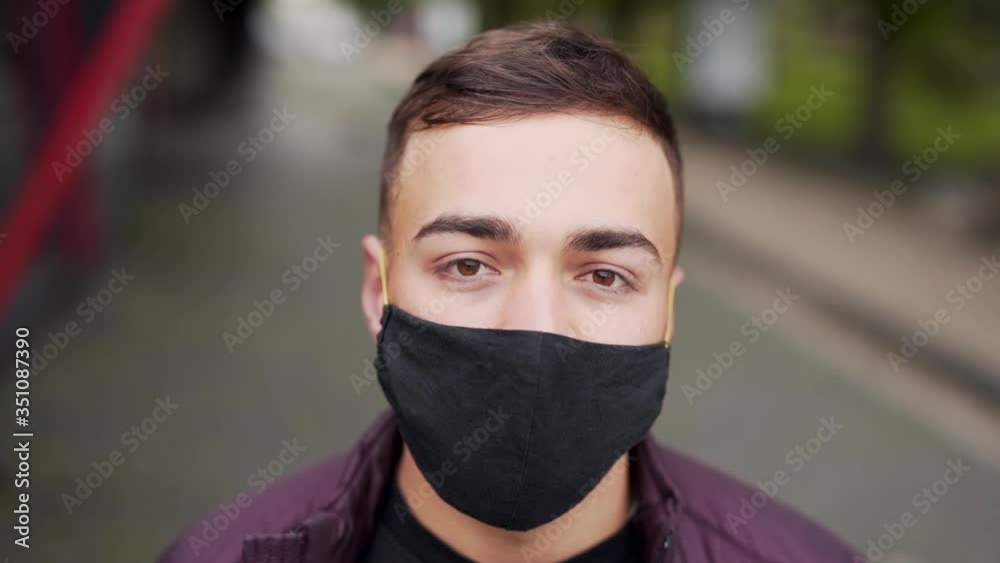 guy in a mask portrait on the street soft light guy in a mask portrait on the street soft light