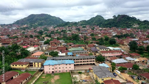 Buildings, school and homes in the town of Ikare-Akoko in the Ondo State of Nigeria - aerial view photo
