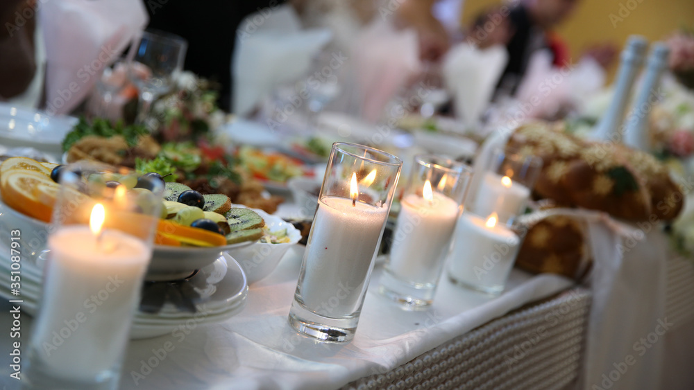 Wedding with food and candles.