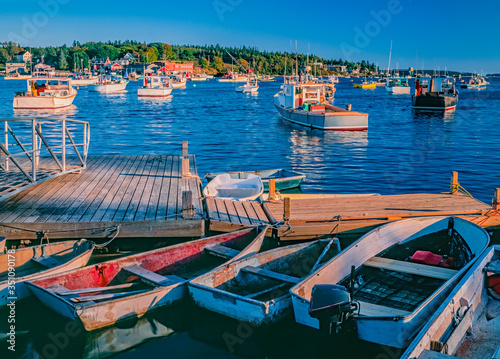 Fishing village Bass Harbor is warmly lit in the last part of the day.
