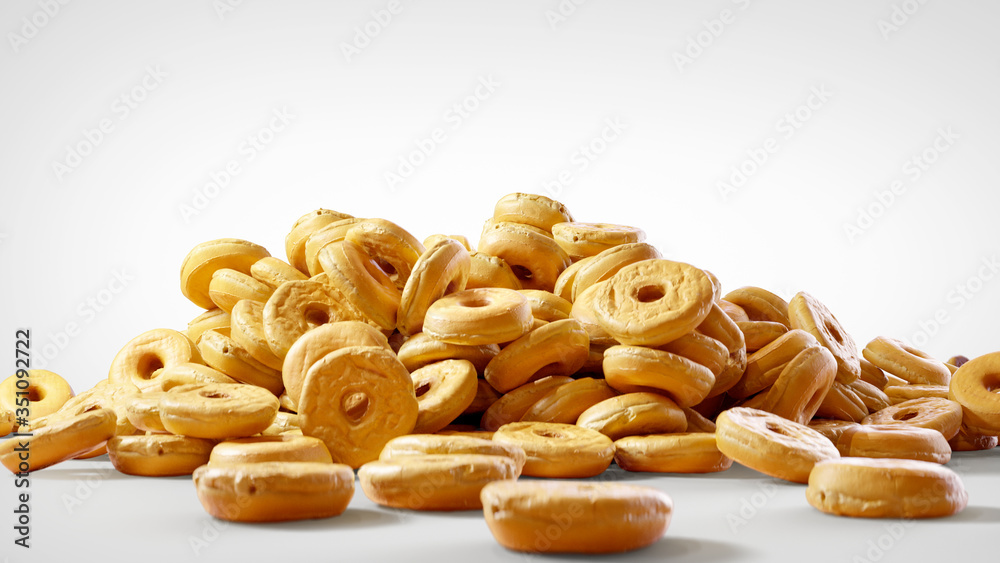 Close-up on Stacked Plain Donuts. Pile of Sweet Doughnuts with Icing on White Background. Close-up on Stacked Plain Donuts. Pile of Sweet Doughnuts with Icing on White Background.