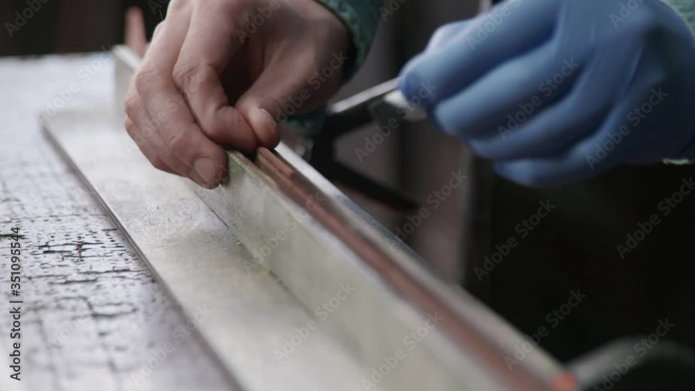 Applying Black Edge Dye to Leather. Working process of the leather belt in the leather workshop. Applying Black Edge Dye to Leather. Working process of the leather belt in the leather workshop.