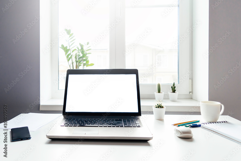 A table with laptop. A table with laptop.