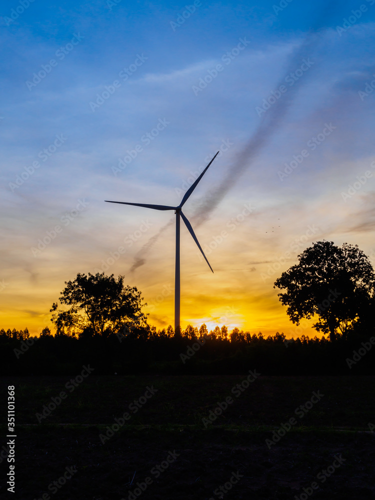 Wind turbines silhouette at sunset Wind turbines silhouette at sunset