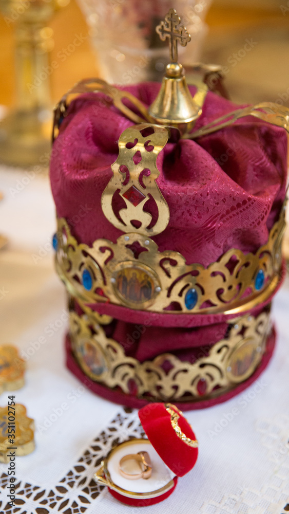 Crown for a wedding couple in a church.