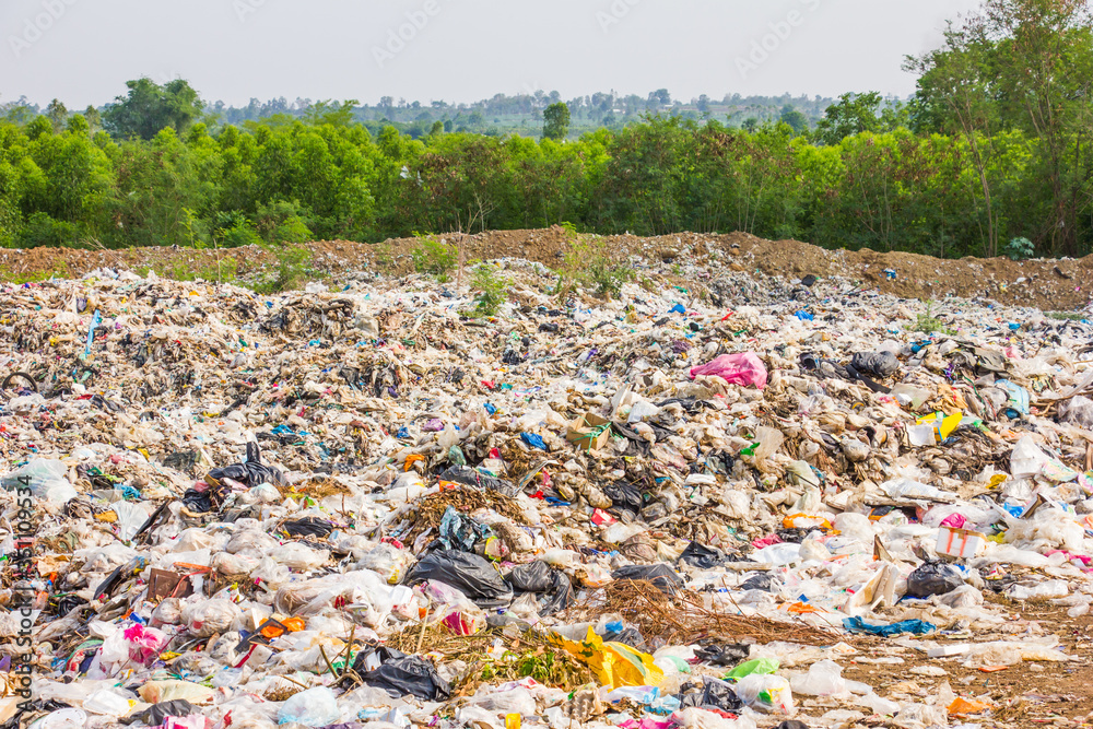 garbage dump pile in trash dump or landfill,truck is dumping the gabage from municipal,pollution concept garbage dump pile in trash dump or landfill,truck is dumping the gabage from municipal,pollution concept