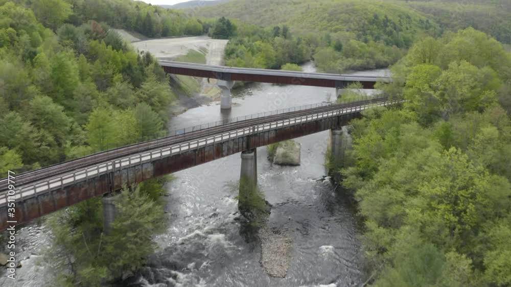 Drone Shot Of RailRoad Bridge Crossing A Creek Drone Shot Of RailRoad Bridge Crossing A Creek