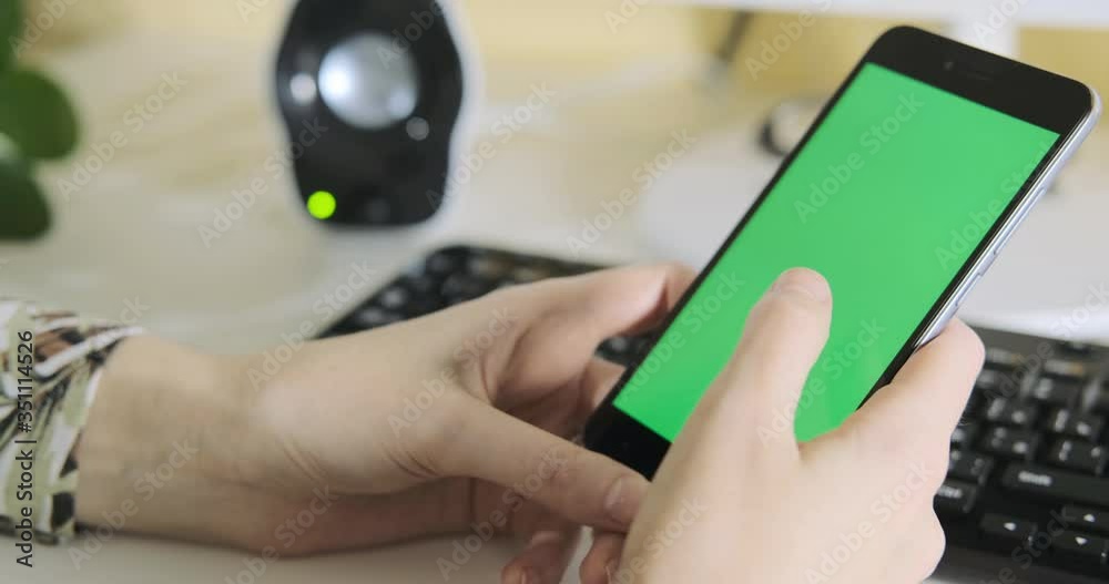 Woman Typing On A Cell Phone Woman Typing On A Cell Phone