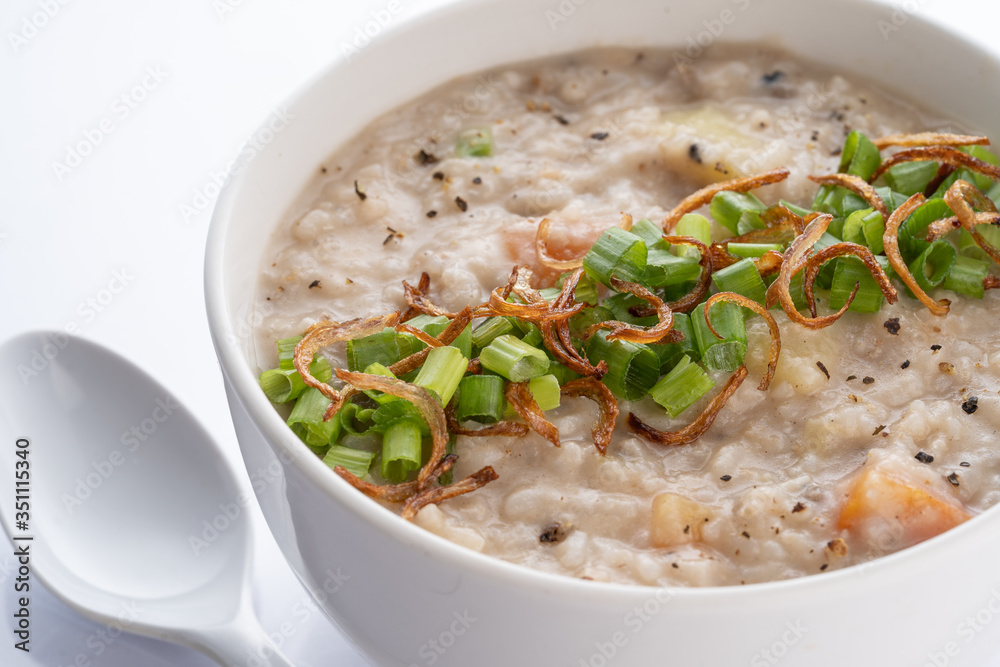 ramadhan famous food bubur lambuk in a white bowl and background ramadhan famous food bubur lambuk in a white bowl and background