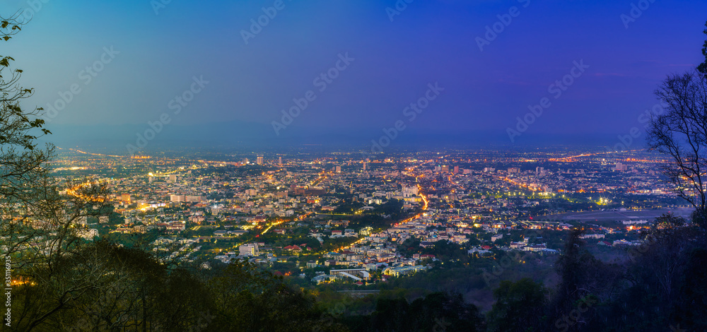 Beautiful of Landscape View cityscape over The color of the lights and city center of Chiang mai,Thailand at twilight night background.