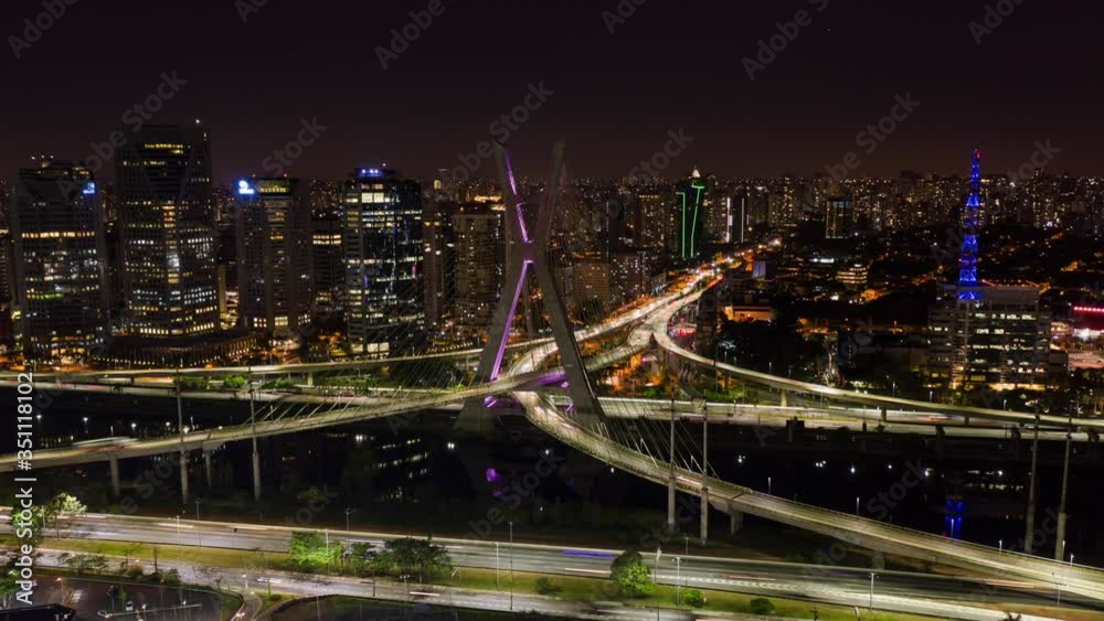 The Octavio Frias de Oliveira bridge or Ponte Estaiada cable stayed suspension bridge built over the Pinheiros River in the city of Sao Paulo, Brazil. Aerial Hyper lapse The Octavio Frias de Oliveira bridge or Ponte Estaiada cable stayed suspension bridge built over the Pinheiros River in the city of Sao Paulo, Brazil. Aerial Hyper lapse