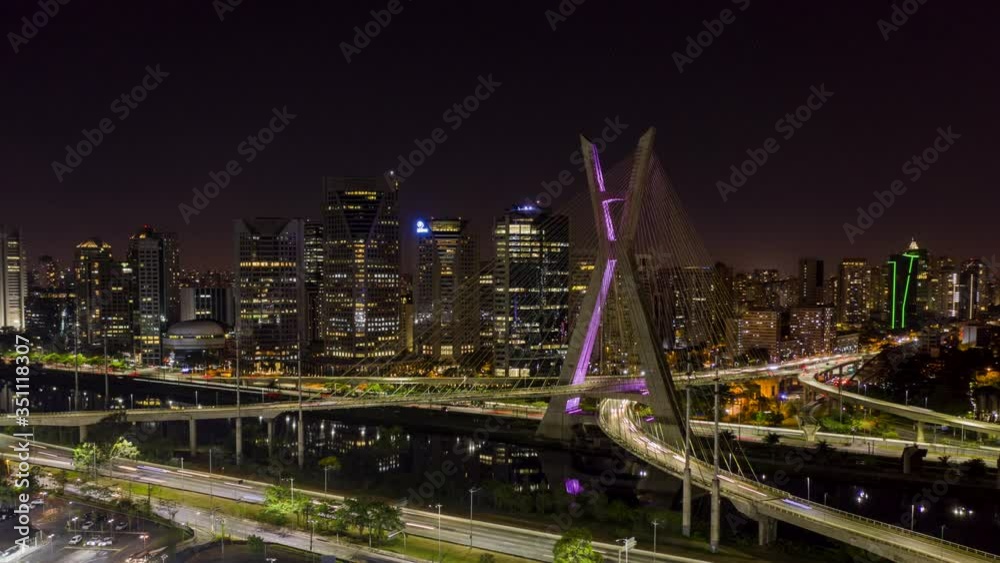 The Octavio Frias de Oliveira bridge or Ponte Estaiada cable stayed suspension bridge built over the Pinheiros River in the city of Sao Paulo, Brazil. Aerial Hyper lapse
