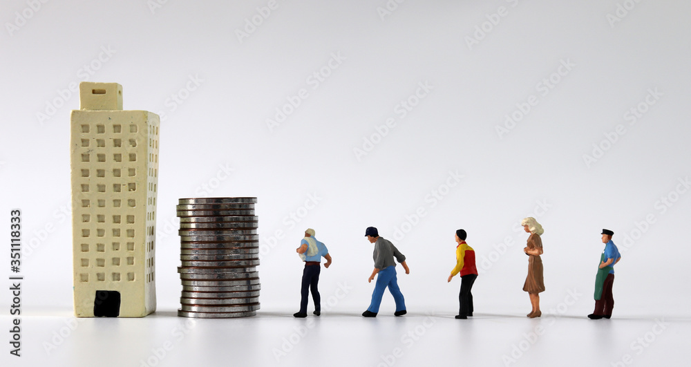Any of various miniature people lining up beside a pile of coins and a miniature building.
Any of various miniature people lining up beside a pile of coins and a miniature building.