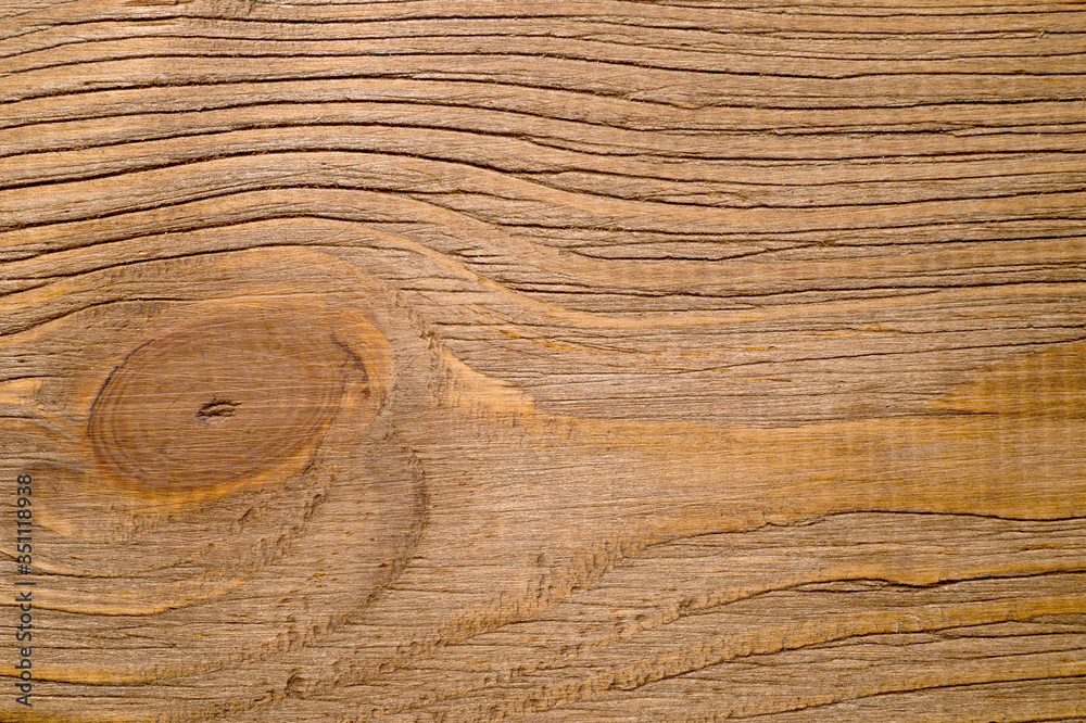 Naklejka premium The texture of the wooden background consisting of boards painted in the color of wenge, designed for photographs.