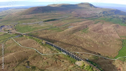 Aerial of The Ribblehead Viaduct a Grade II listed structure, the Viaduct runs the Settle to Carlisle railway route in North Yorkshire, England. photo