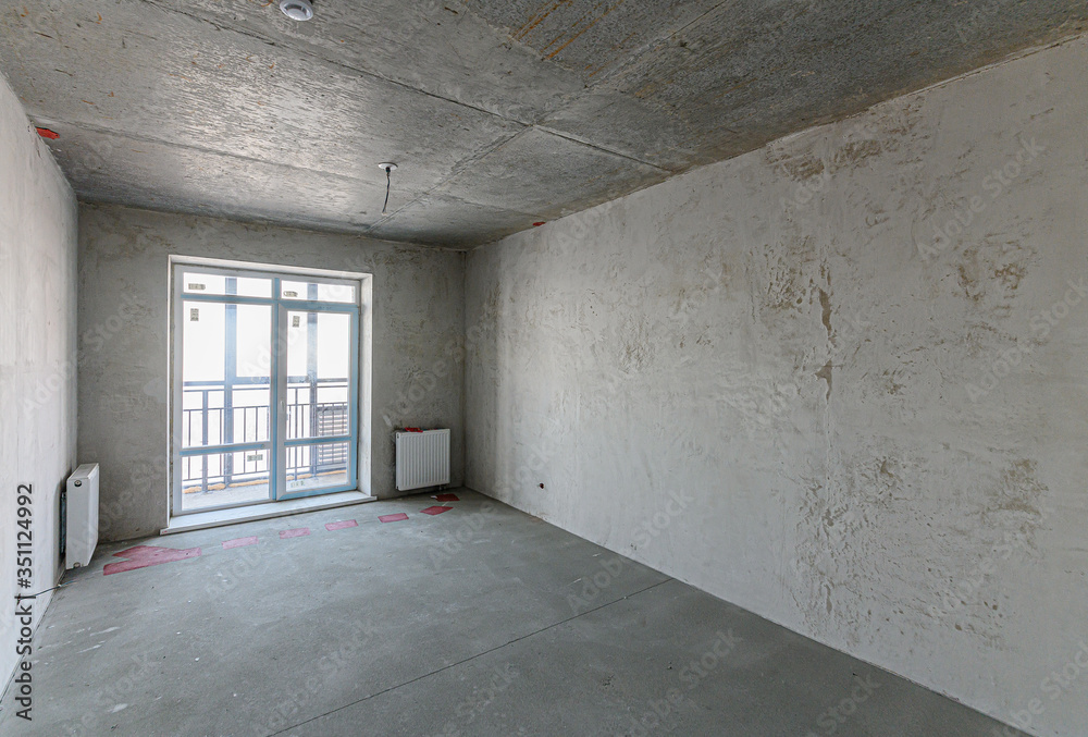 Russia, Moscow- January 25, 2020: interior room apartment rough repair for self-finishing. interior decoration, bare walls of the room, stage of construction