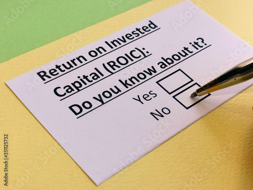 A person is answering question about return on invested capital (ROIC).