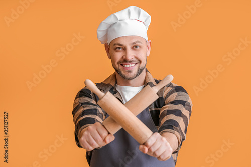 Smiling male baker in chef ...