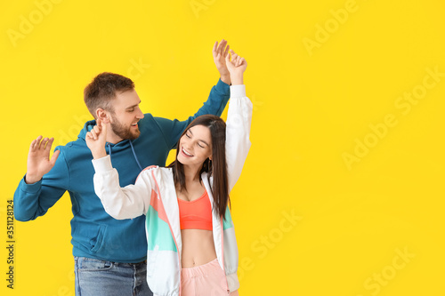 Happy young couple dancing ...