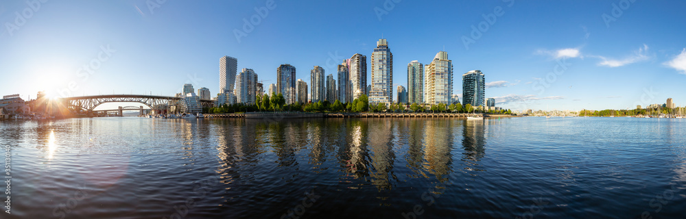 False Creek, Downtown Vancouver, British Columbia, Canada. Beautiful Panoramic View of Modern City during a sunny spring sunset. Cityscape Panorama