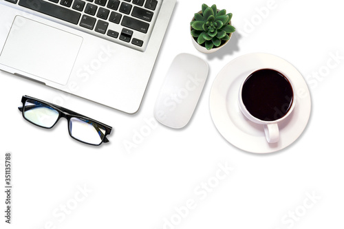 Laptop with coffee, glasses and plant for business tool - topview with copy space