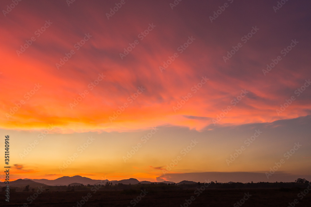 sunset sky over mountain countryside  