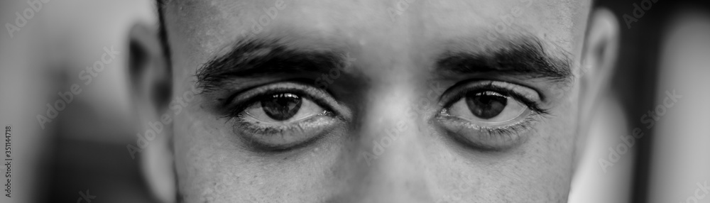 Obraz premium fine black and white portrait of a chprismatic egyptian guy from Alexandria
