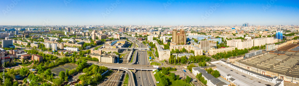 Fototapeta Aerial top view of road junction in Moscow from above, automobile traffic and the old Ugreshskaya railway station in the Moscow industrial zone near the automobile ring highway