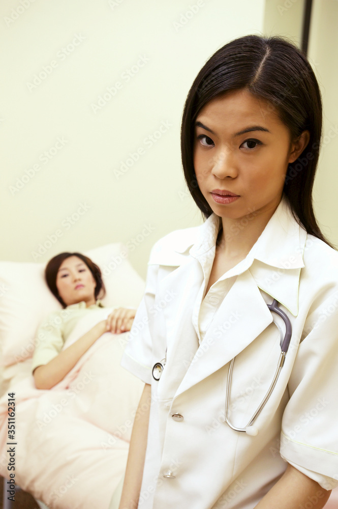 A doctor and a patient in the hospital A doctor and a patient in the hospital