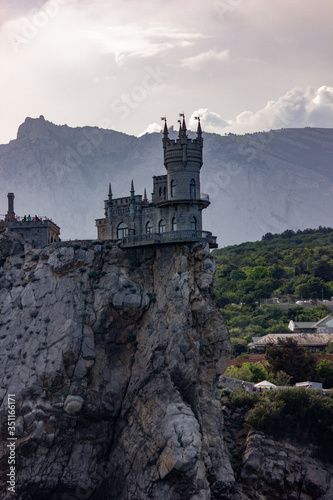 Crimea, Yalta. View of the castle "Swallow's Nest". Tourism in the Crimea. The rock on which the castle stands.