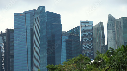 Telephoto of Glass Facade of Modern Office Skyscrapers in Finance District of Singapore © YuriFineart