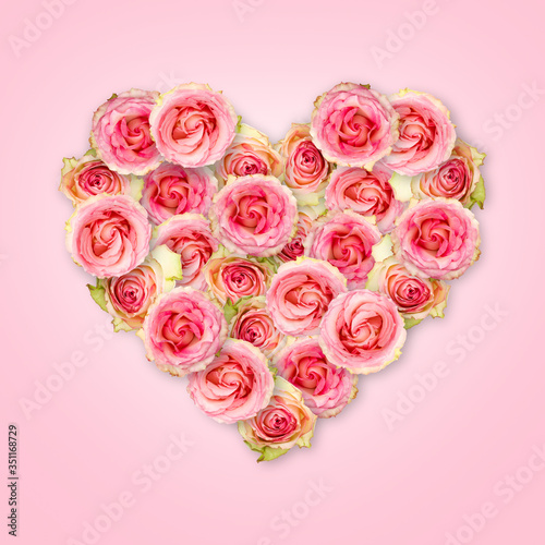 Wallpaper Mural Bouquet of tea roses in the shape of a heart on a pastel pink background. Valentine's Day. Love concept. Torontodigital.ca