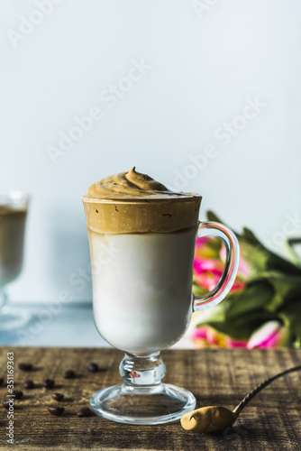 Dalgona Trend Coffee Korean latte drink with instant coffee foam. Cold fashion trendy drink